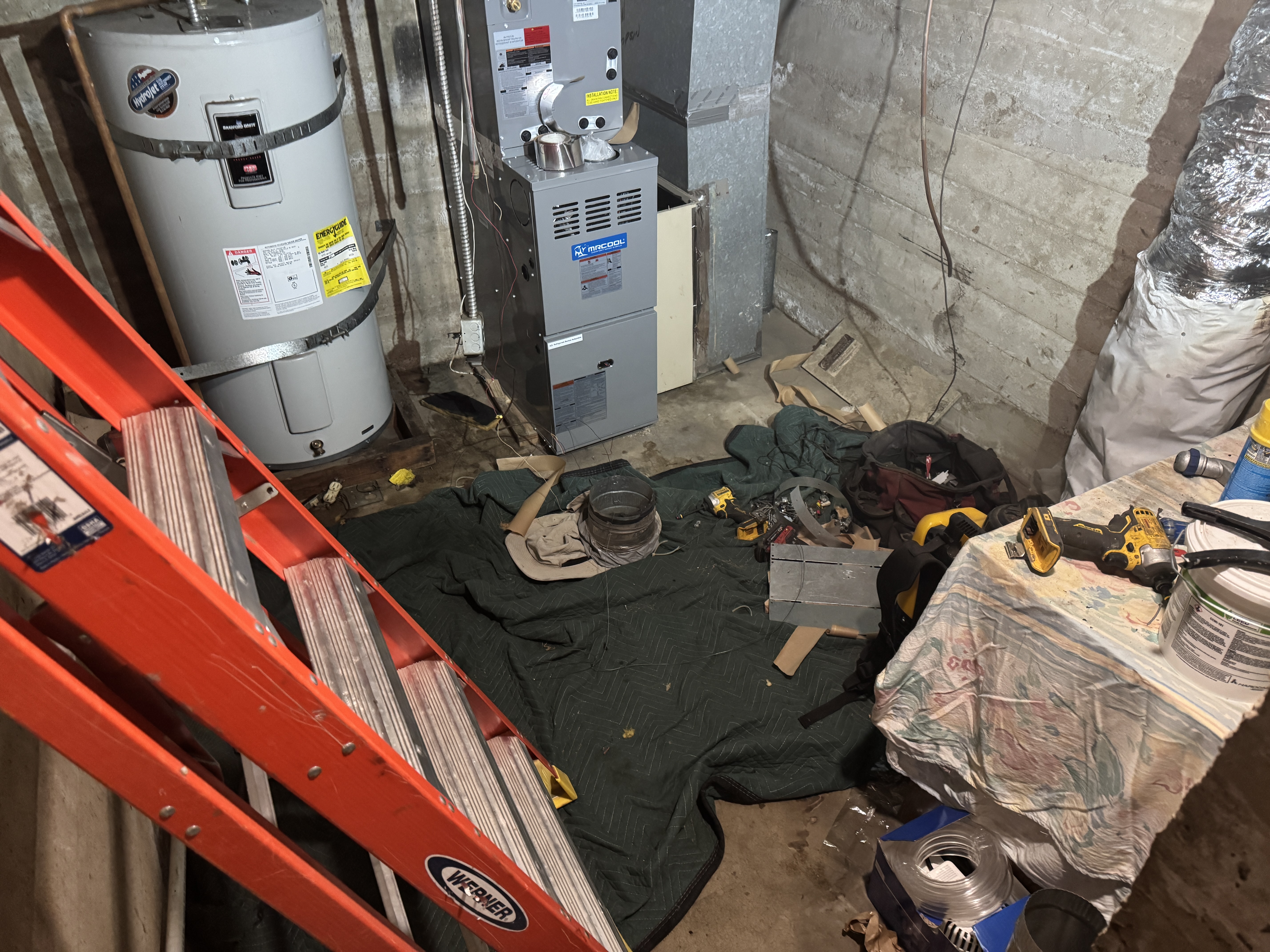 Technician checking HVAC unit